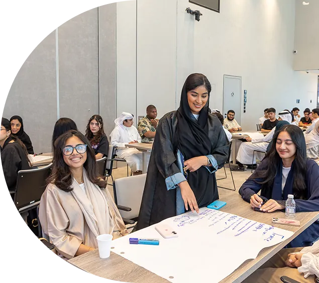 Watheq participants working together during an NBB-sponsored session